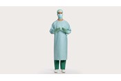 a male clinician wearing BARRIER surgical gown fluid protection plus